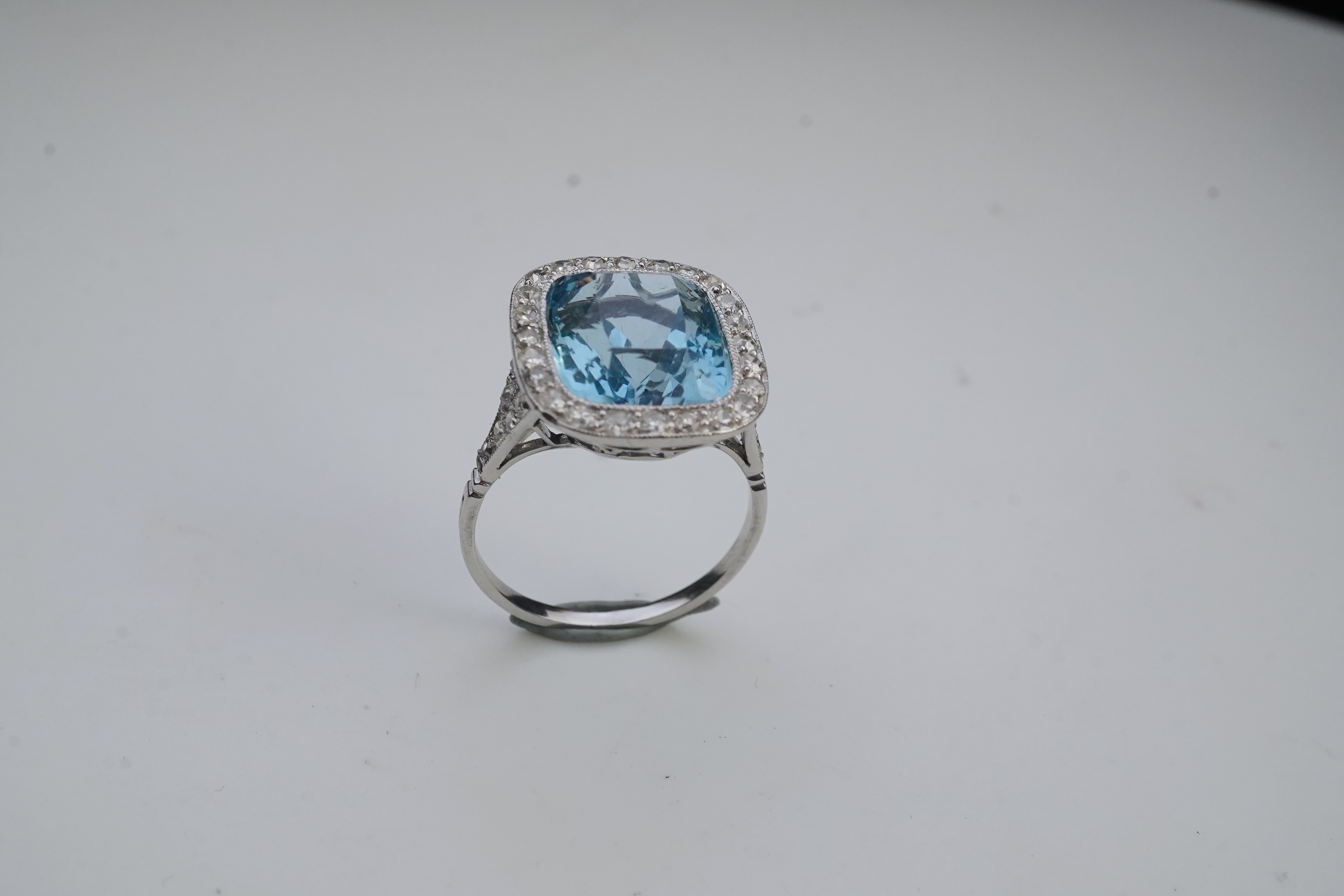 An attractive aquamarine and diamond ring